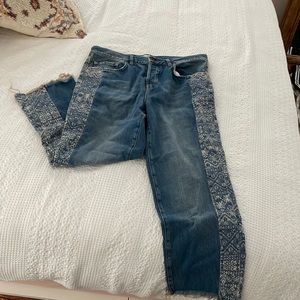 Free People, We the Free, size 29 distressed jeans with pattern down side.